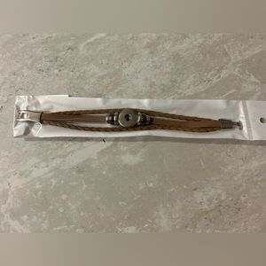 Leather style  light brown bracelets with silver colored details